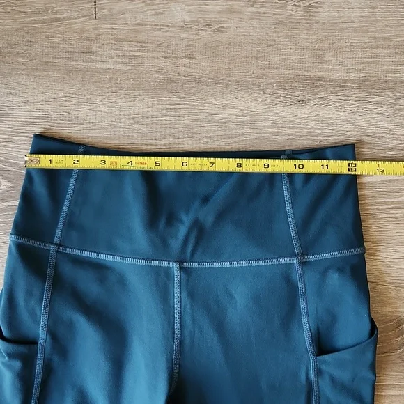 Fabletics Oasis High Waisted Twist 7/8 Leggings Midnight Wave Teal Activewear - Picture 5 of 12